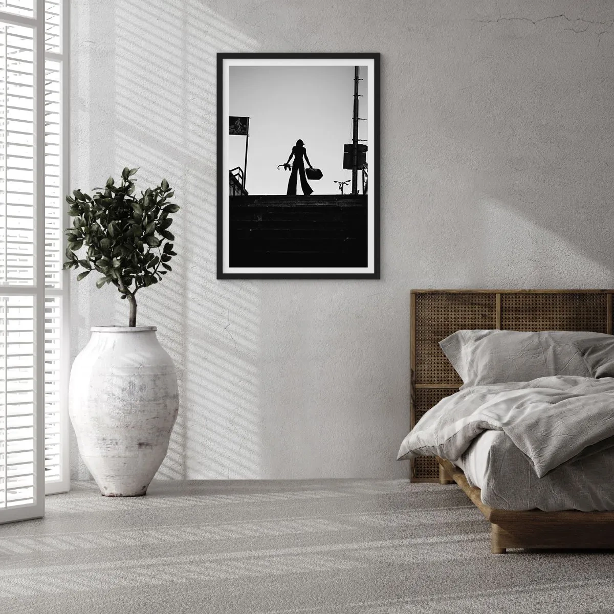 Poster in black frame - Silhouette of a woman with a suitcase against the backdrop of the setting sun - 50x70cm - City Wander - Modern wall decoration for the living room and bedroom ARTTOR