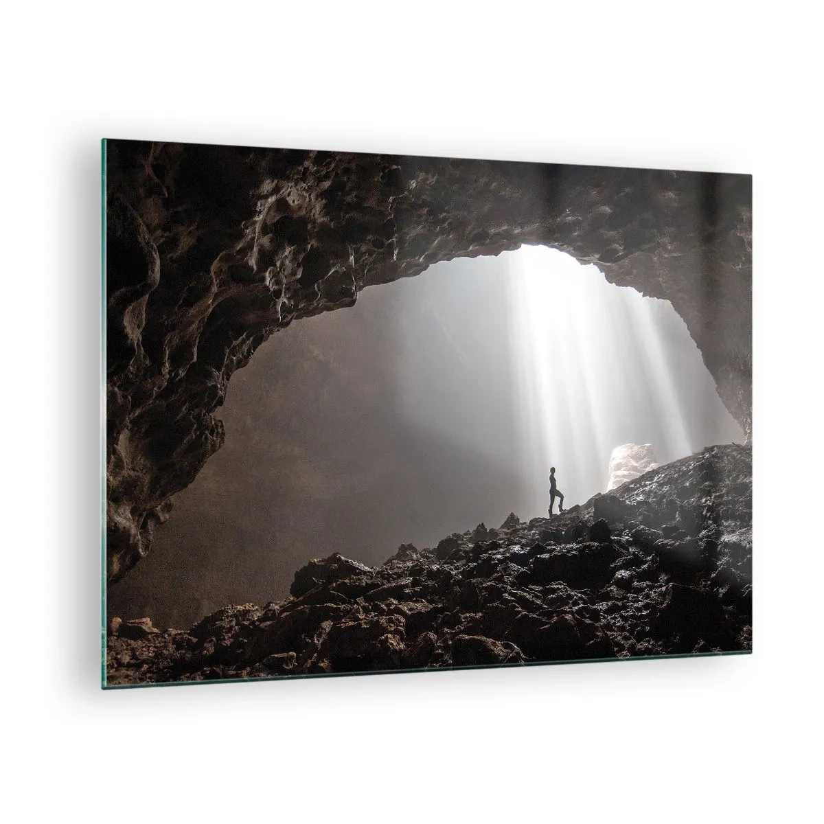 Glass picture - A figure in a cave illuminated by rays of light, surrounded by dark rocks - 70x50cm - Luminous Grotto - Modern wall decoration for the living room and bedroom ARTTOR