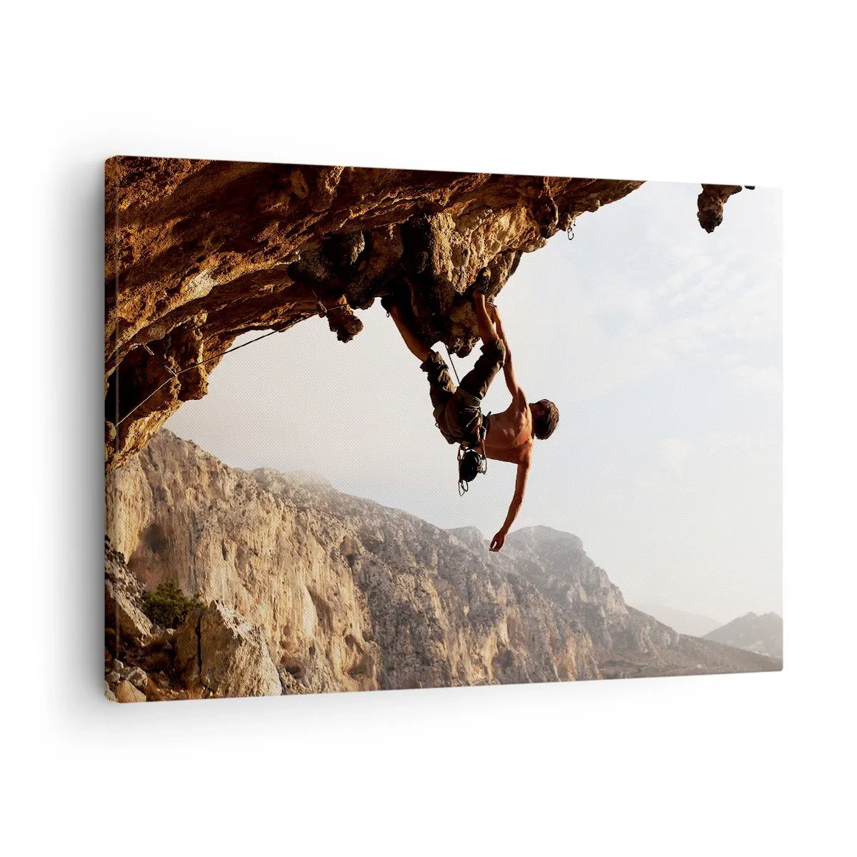 Canvas picture - A climber on a steep cliff in the mountains in the sunshine - 70x50cm - The Whole World on a Sharp Cliff - Modern wall decoration for the living room and bedroom ARTTOR