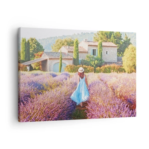 Canvas picture - A woman in a blue dress walking through a lavender field with a view of a house. - 70x50cm - Lavender Girl - Modern wall decoration for the living room and bedroom ARTTOR
