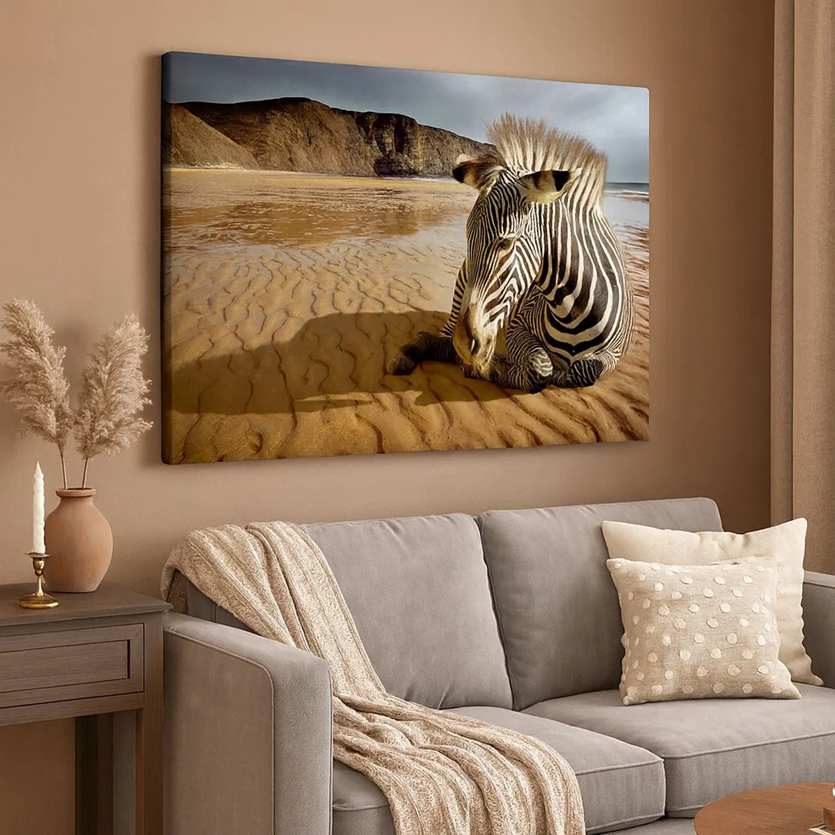 Canvas picture - A zebra resting on a sandy beach with cliffs in the background. - 70x50cm - We Suit Each Other - Modern wall decoration for the living room and bedroom ARTTOR