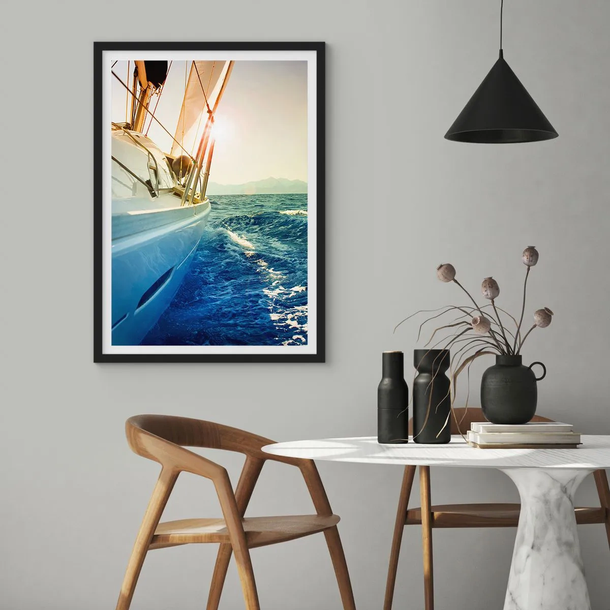 Poster in black frame - A yacht sailing through a calm sea in the warm light of the sun - 50x70cm - In Search of Adventure - Modern wall decoration for the living room and bedroom ARTTOR