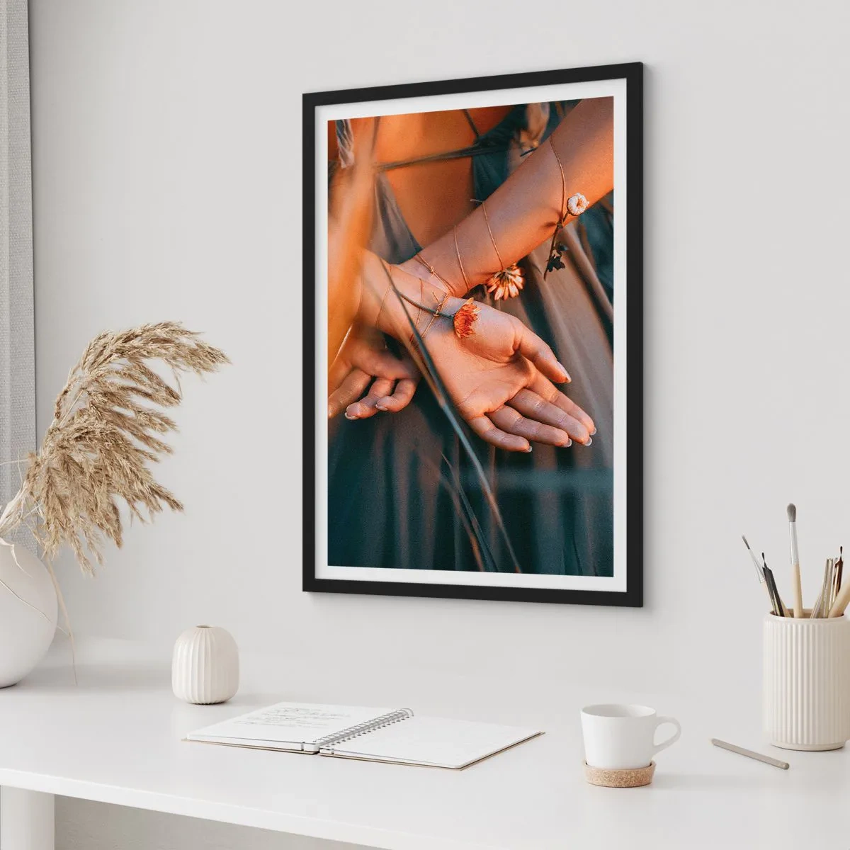 Poster in black frame - Hands entwined with delicate flowers in golden light - 50x70cm - Connected with Nature - Modern wall decoration for the living room and bedroom ARTTOR