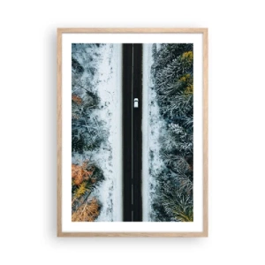 Poster in light oak frame - Through a Wintery Forest - 50x70 cm