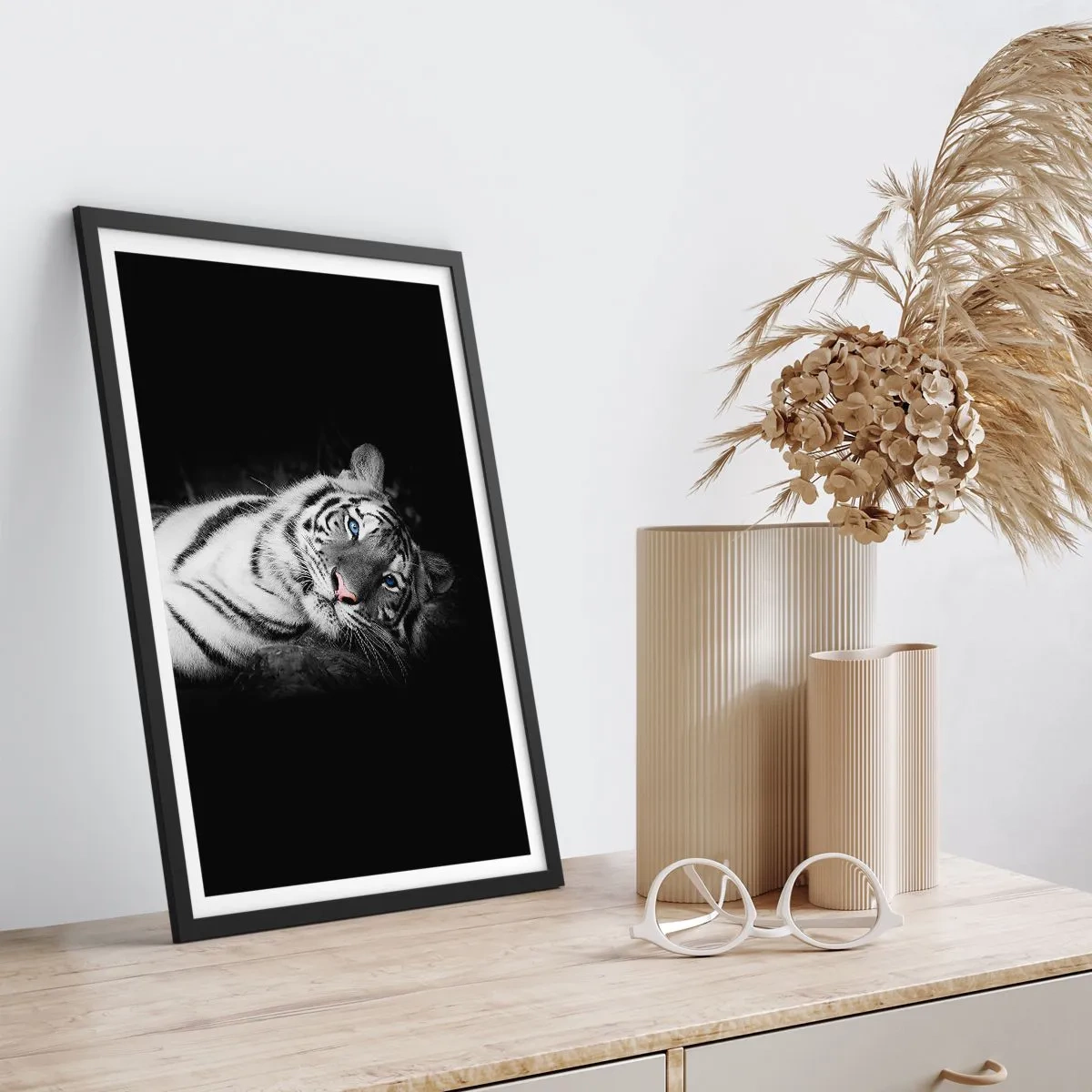 Poster in black frame - A white tiger in a contrasting shot against a black background - 50x70cm - Wilderness and Calm - Modern wall decoration for the living room and bedroom ARTTOR
