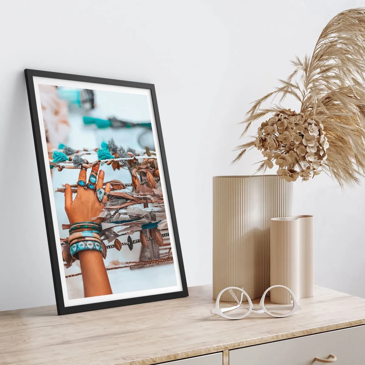 Poster in black frame - A hand adorned with jewelry against a boho backdrop - 50x70cm - Local Treasures - Modern wall decoration for the living room and bedroom ARTTOR