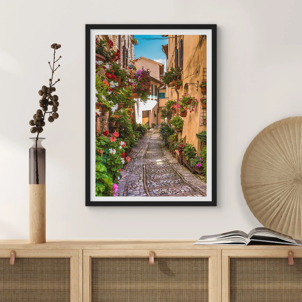 Poster in black frame - A charming street with flowers and a cobblestone path on a sunny day - 50x70cm - Italian Back Street - Modern wall decoration for the living room and bedroom ARTTOR