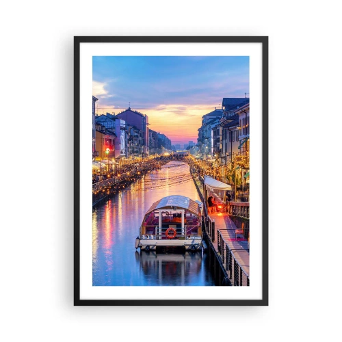 Poster in black frame - Canal with boat and evening lighting in a pastel sunset - 50x70cm - Evening of Light and Fun - Modern wall decoration for the living room and bedroom ARTTOR
