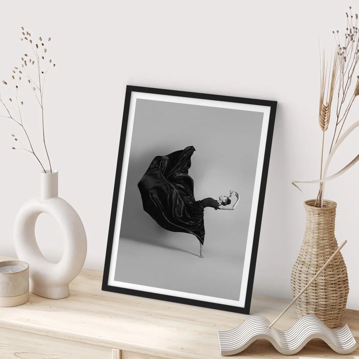 Poster in black frame - An elegant dancer in a black dress in motion - 50x70cm - On the Wings of Music - Modern wall decoration for the living room and bedroom ARTTOR