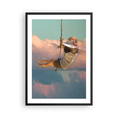 Poster in black frame - A woman on a swing among pastel clouds - 50x70cm - Fun in the Clouds - Modern wall decoration for the living room and bedroom ARTTOR