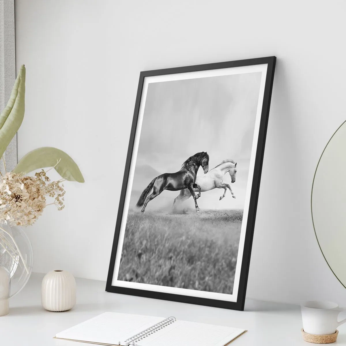 Poster in black frame - Black and white horses galloping dynamically against a field background - 50x70cm - Angels and Demons - Modern wall decoration for the living room and bedroom ARTTOR
