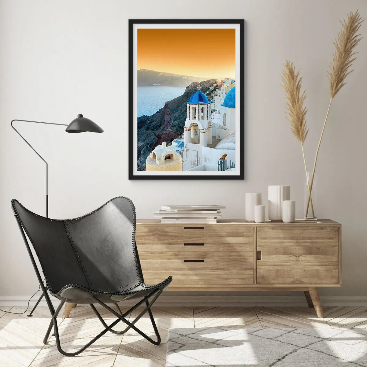 Poster in black frame - Santorini - Snuggling up to the Rocks - 61x91 cm