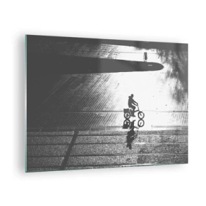 Glass picture - Man riding a bicycle through the city, reflection in the water, black and white shot - 70x50cm - Straight ahead, through the City - Modern wall decoration for the living room and bedroom ARTTOR
