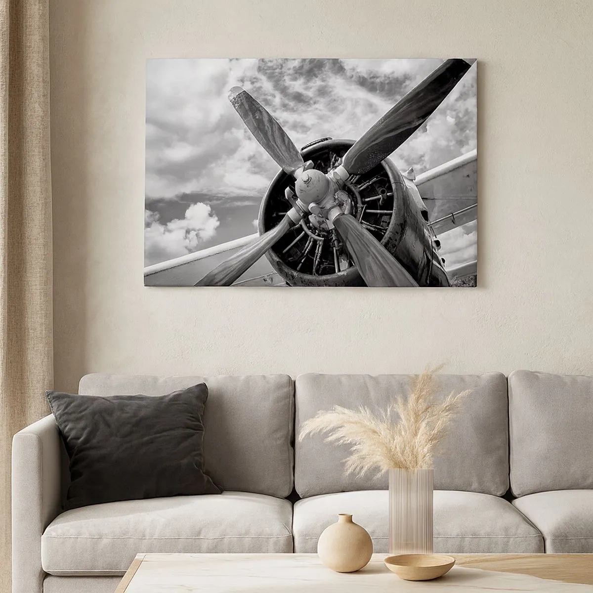 Canvas picture - A black and white photo of an airplane propeller against a dynamic sky. - 70x50cm - Conquerer of the Skies - Modern wall decoration for the living room and bedroom ARTTOR