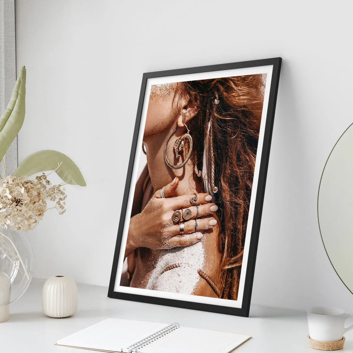 Poster in black frame - Detail of jewelry on sandy leather background - 50x70cm - Queen of a Wild Beach - Modern wall decoration for the living room and bedroom ARTTOR