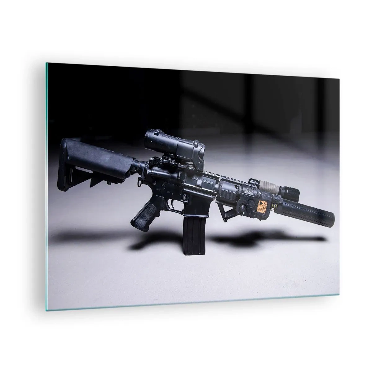 Glass picture - A black assault rifle with accessories lying on a light background - 70x50cm - Dark Knight - Modern wall decoration for the living room and bedroom ARTTOR