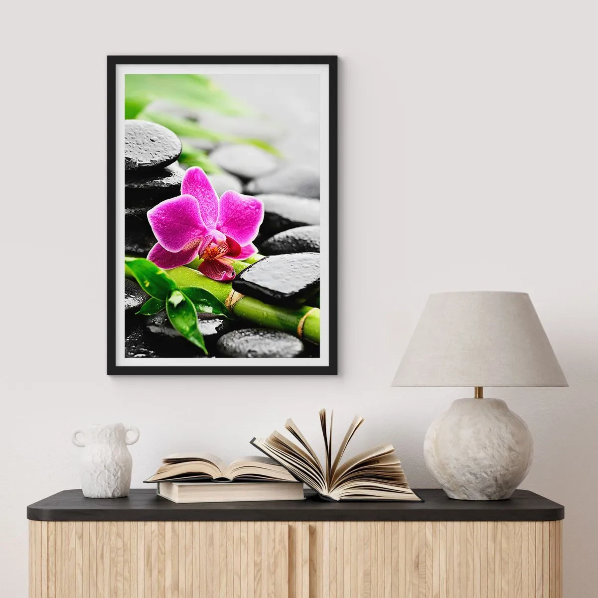 Poster in black frame - Purple orchid on wet stones and green leaves - 50x70cm - In a Peaceful Balance - Modern wall decoration for the living room and bedroom ARTTOR